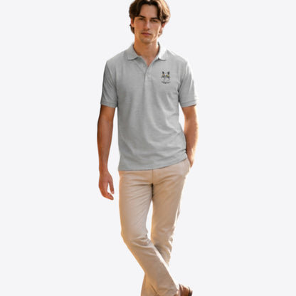 Maro Wilde grey 100% organic cotton unisex polo shirt with embroidered cat graphic and "Pumaki" text.