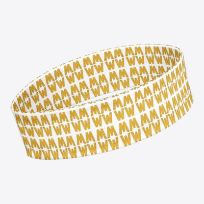 Maro Wilde white elastic headband with repeating gold MW pattern. Made of 82% polyester, 18% elastane.