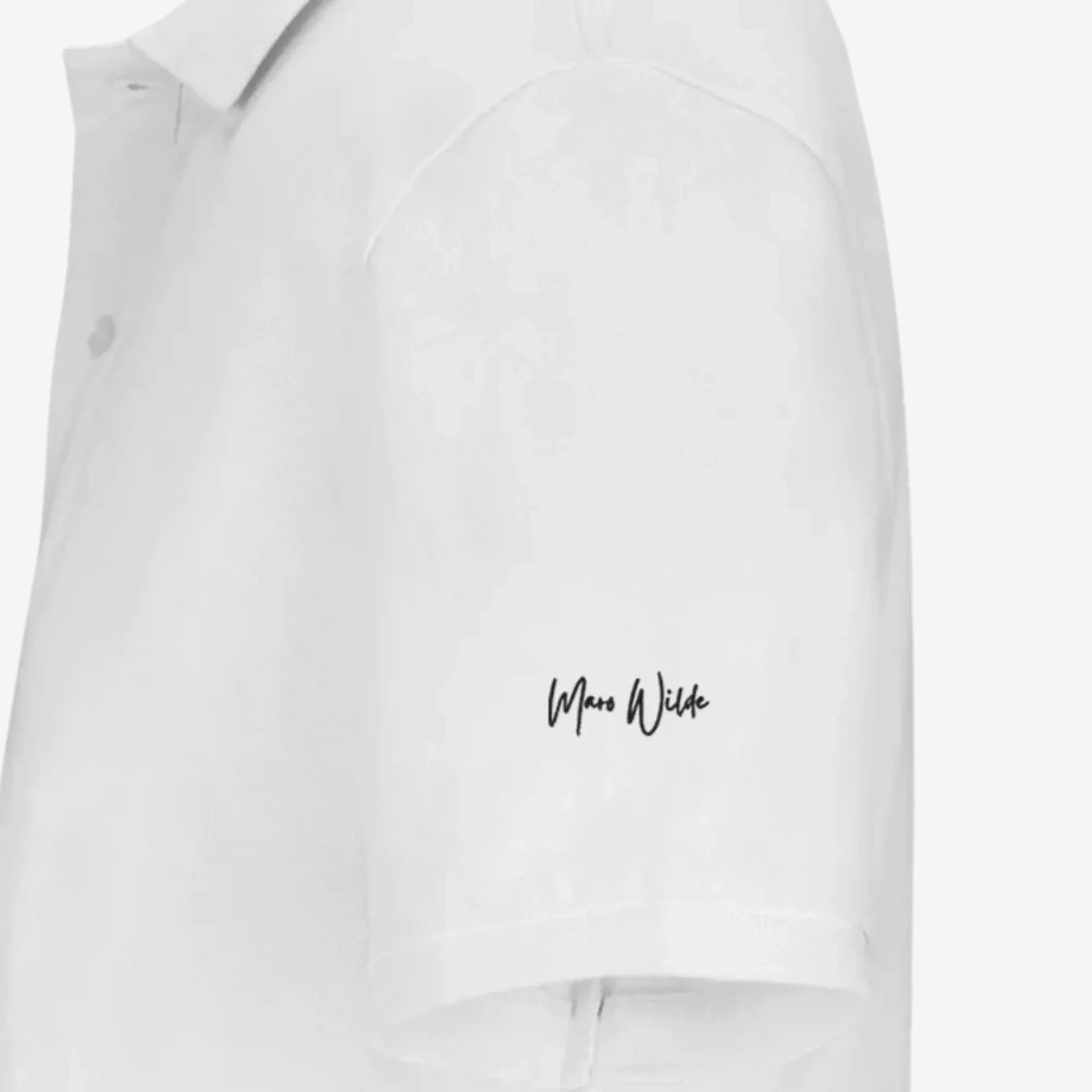 Maro Wilde white 100% organic cotton unisex polo shirt with embroidered signature logo on sleeve.
