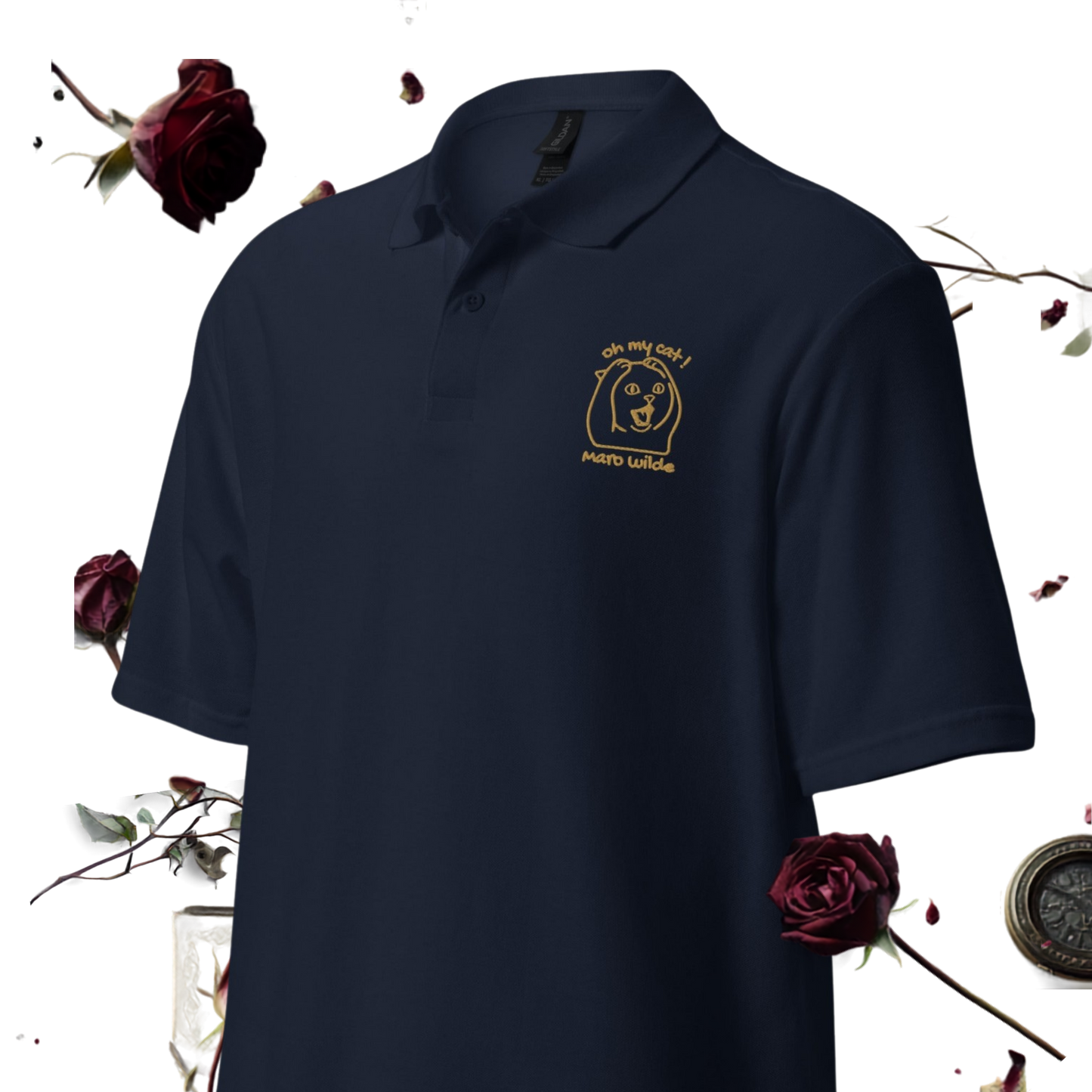 A navy blue polo shirt with a gold embroidered logo on the left chest, displayed against a white background with decorative dark red roses and a compass.